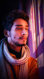 Portrait of young man looking away