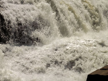 Waves splashing on rocks