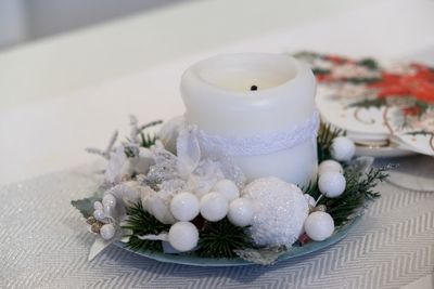 Candle decoration on the table during christmas