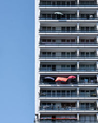 Low angle view of building against clear blue sky