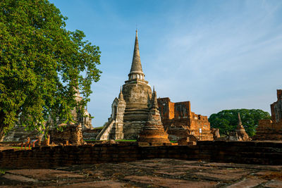 Low angle view of old temple building against sky