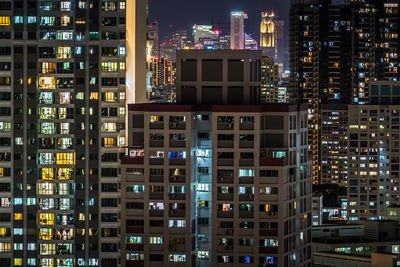 Illuminated buildings in city at night