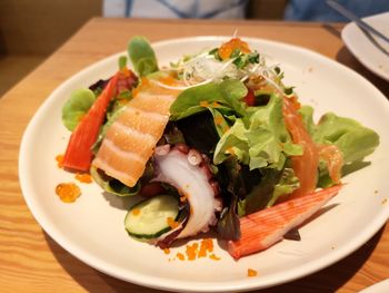 Close-up of salad served in plate on table