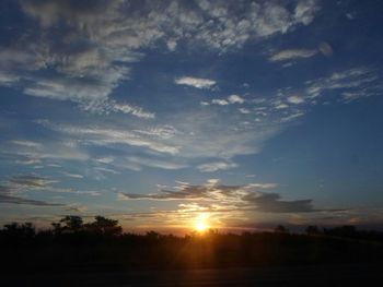 Scenic view of silhouette landscape against sky during sunset