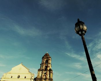 Low angle view of clock tower against sky