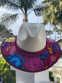 Close-up of hat on palm tree