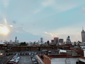 High angle view of buildings against sky during sunset