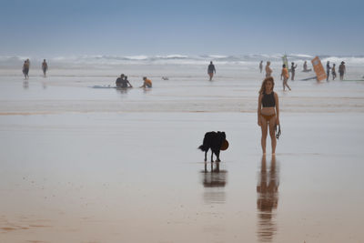 People walking on beach