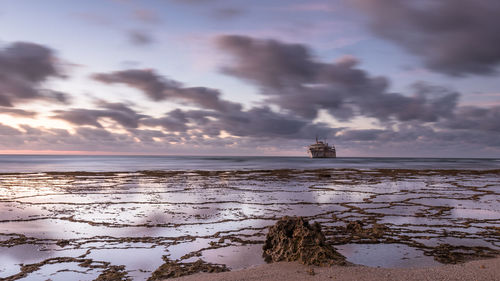 Scenic view of sea against sky during sunset