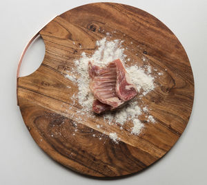 Directly above shot of meat on cutting board