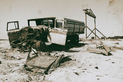 Abandoned built structure on field