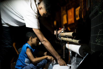 People working in kitchen