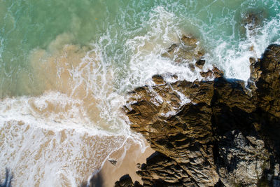 Waves splashing on rocks