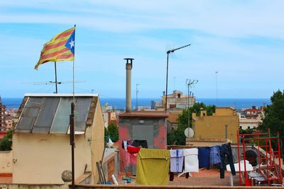 Catalonia flag waving on building terrace