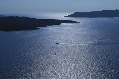 Scenic view of sea against clear blue sky