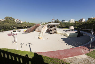 View of buildings in city against clear sky