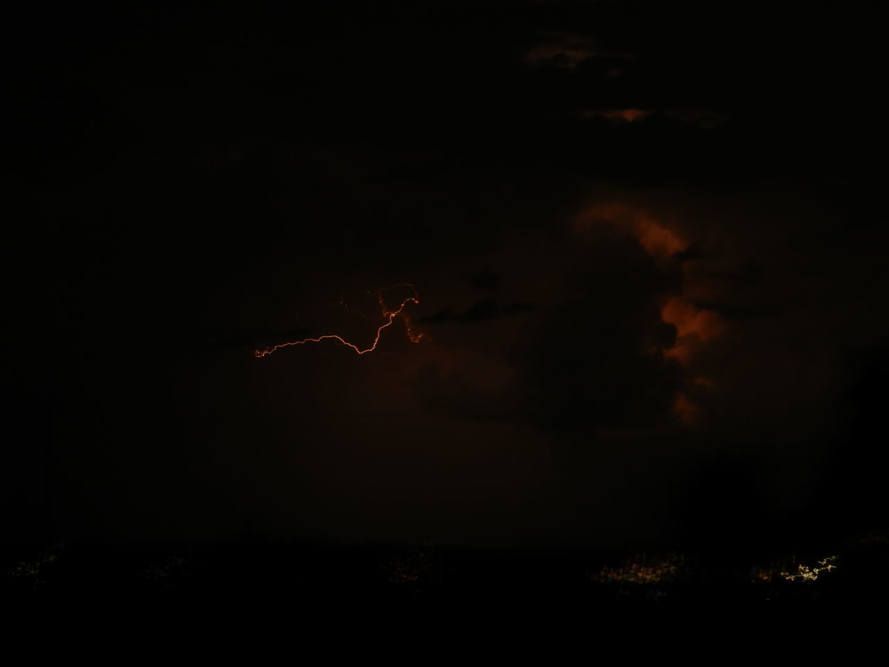 darkness, night, lightning, sky, cloud, no people, beauty in nature, nature, thunder, light, illuminated, power in nature, outdoors, dark, copy space, motion, smoke