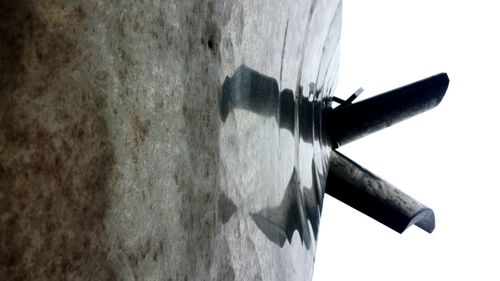 Low angle view of sculpture against sky