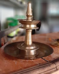 Close-up of metallic object on table