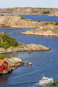 High angle view at the swedish archipelago with a motorboat