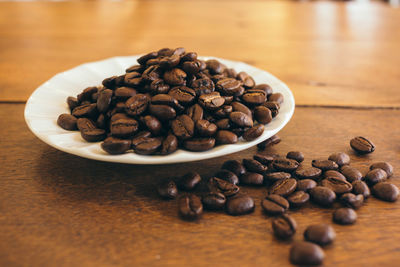 Close-up of coffee beans on table