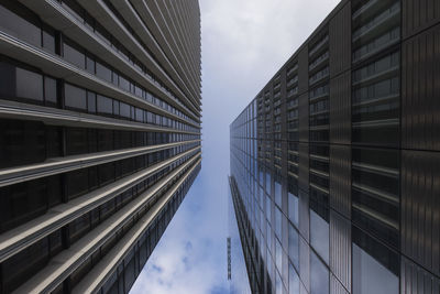 Low angle view of modern buildings against sky