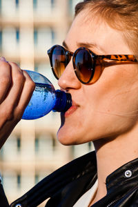 Close-up of woman wearing sunglasses