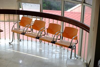 Empty chairs and table in restaurant