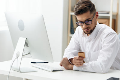 Businesswoman working at desk in office