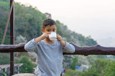 Portrait of cute boy outdoors