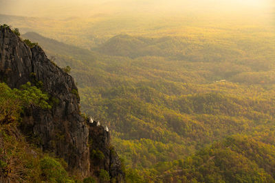 Scenic view of landscape and mountains against sky