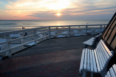 Scenic view of sea against sky during sunset, sylt