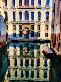 High angle view of buildings by canal