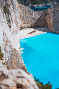 High angle view of beach by rocks