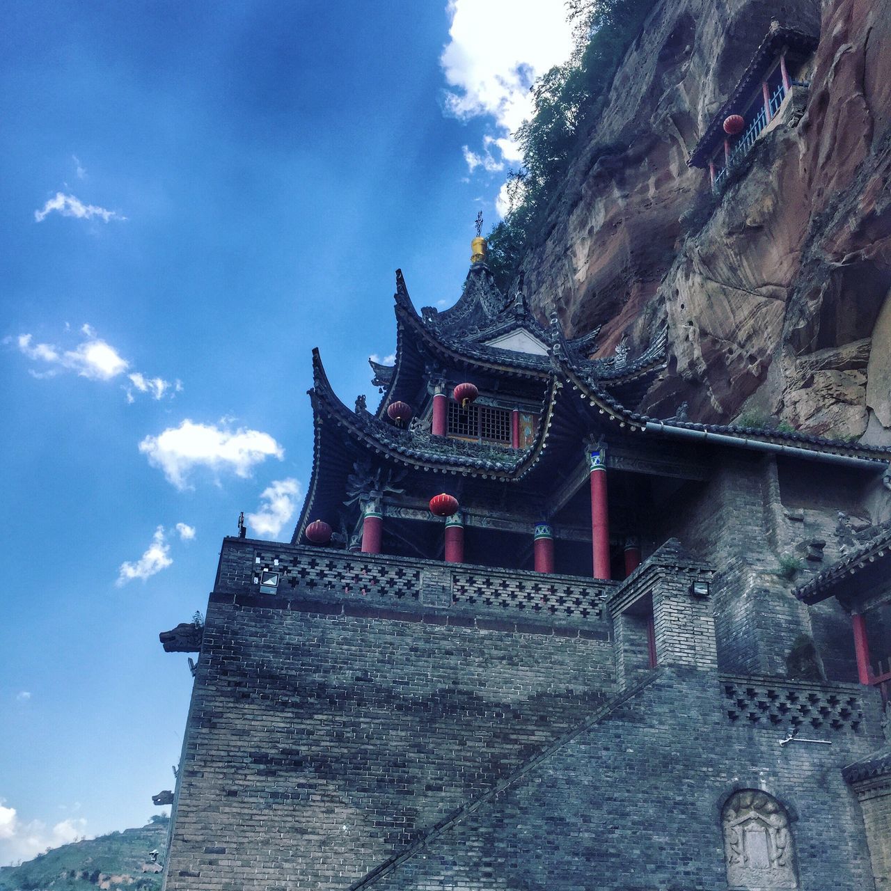 place of worship, architecture, religion, built structure, building exterior, spirituality, temple - building, sky, low angle view, famous place, history, travel destinations, temple, tradition, cultures, travel, church, tourism