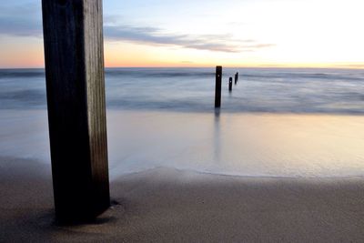 Scenic view of sea against sky at sunset