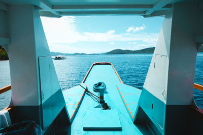 Sailboat sailing in sea against sky