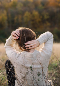 Woman standing on field