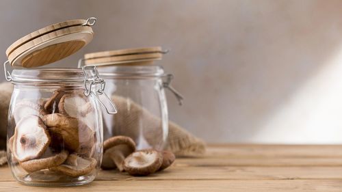 Close-up of jar on table