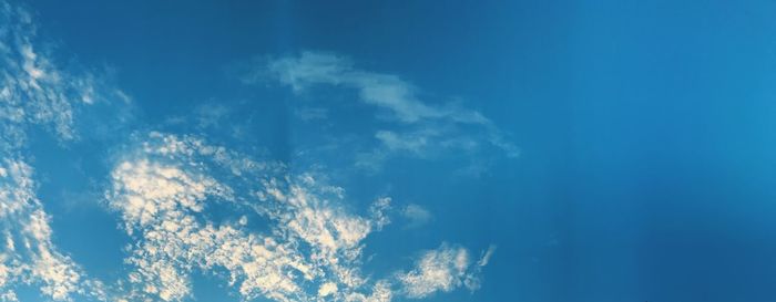 Low angle view of clouds in blue sky