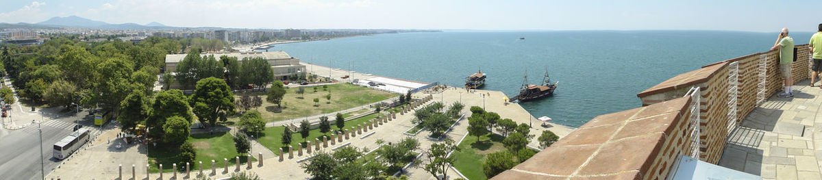 Panoramic view of sea and field