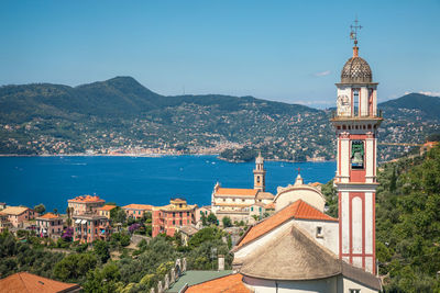 View of chiesa sant'andrea di rovereto at chiavari, portofino area visible on the horizon.