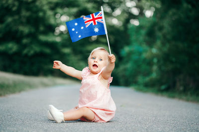 Cute girl looking away flag