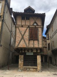 Low angle view of old building against sky