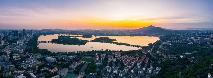 High angle view of townscape against sky during sunset