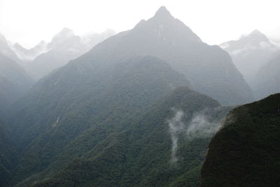 Scenic view of mountains during foggy weather