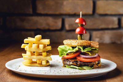 Close-up of burger in plate on table