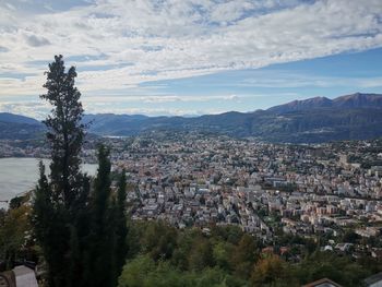 Aerial view of townscape against sky