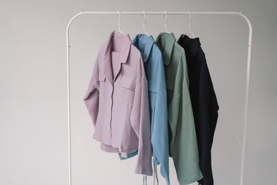 Close-up of clothes hanging on rack