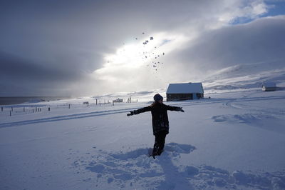 Full length of man on snow against sky